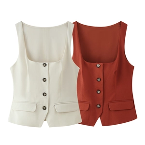 Detail view of square neck button vests in cream white and brick red colors