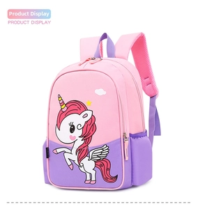 Detailed side view of pink and purple unicorn backpack with mesh water bottle pocket