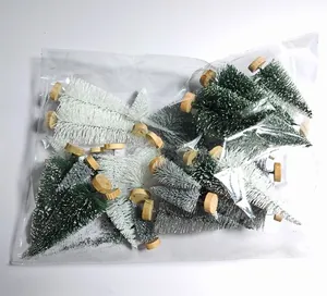 Miniature blue-green sisal Christmas trees with round wooden bases in a clear package