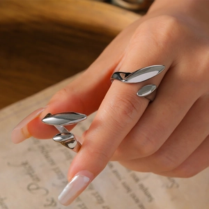 Elegant minimalist adjustable silver ring with a sleek geometric leaf design on hand