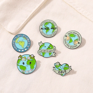 Detailed view of 6 enamel pins with eco-friendly themes and Earth Day quotes