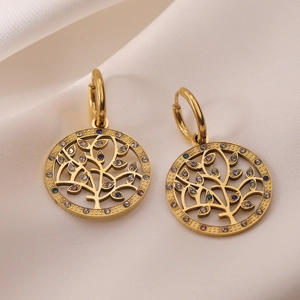 Gold plated tree of life earrings with colorful cubic zirconia on white silk backdrop