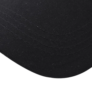 Detailed close-up of cotton baseball cap brim with four rows of reinforced stitching