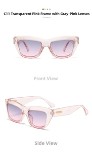 Detail of pink cat-eye sunglasses featuring gold metal trim and gradient purple lenses