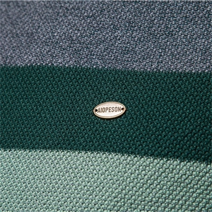 Men's striped crewneck sweater with grey and green knit fabric and metal logo detail