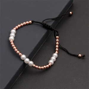 Adjustable woven bracelet with 4mm rose gold copper beads and 6mm white faux pearls
