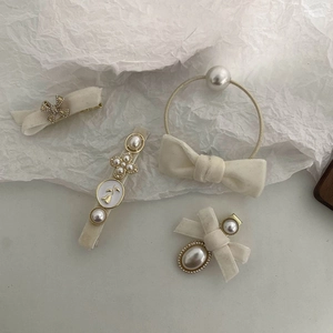 Detailed set of cream velvet bow hair clips and scrunchie with elegant pearls