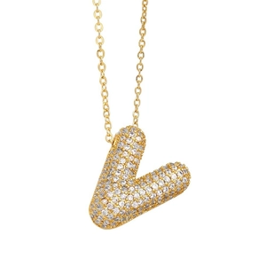 Close-up of golden letter L balloon pendant necklace inlaid with sparkling clear crystals