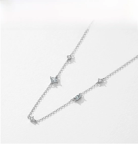 Detailed flat lay of silver S925 sterling silver chain with sparkling zircon stones