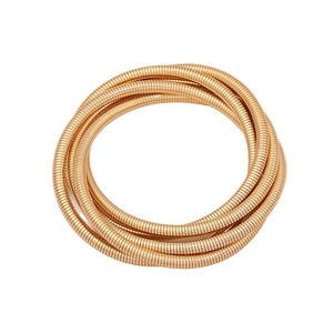 Minimalist multi-layer gold spring coil bracelet set with stacked metallic snake chains