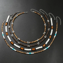 Detailed view of bohemian beaded necklaces with tiger eye stones and lobster clasps