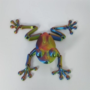 Macro shot of 3D printed articulated frog with rainbow metallic finish and hinged joints