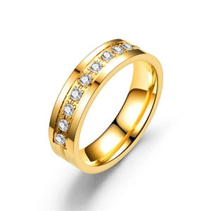 Detail of 18K gold titanium steel ring featuring ten inlaid cubic zirconia stones
