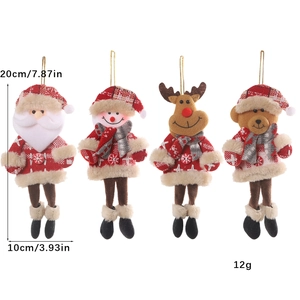 Detail showing plush Christmas tree hanging ornaments in Santa Snowman Reindeer and Bear styles
