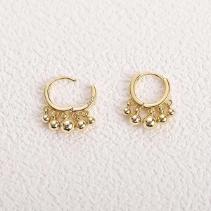 Elegant 925 sterling silver gold hoop earrings with five hanging bead charms on white background