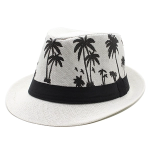 White straw fedora hat with black tropical palm tree patterns and decorative ribbon band