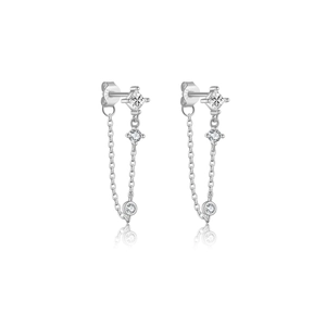 Close-up of S925 sterling silver stamp on shimmering diamond tassel drop earrings