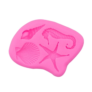 Pink silicone mold featuring seashell, seahorse, and starfish for DIY cake and craft projects