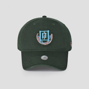 Detailed view of dark green cotton baseball cap with artistic Chinese style embroidery