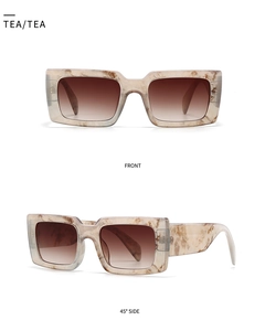 Retro square sunglasses featuring marble texture frame and brown gradient lenses