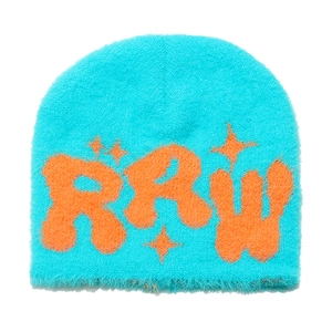 Detail view of teal faux mink beanie with orange RAW letter embroidery and plush texture