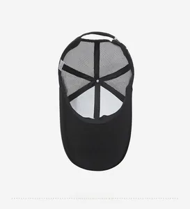 Detail view showing breathable mesh structure and interior stitching of the black baseball cap
