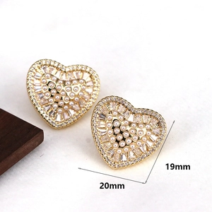 Elegant gold heart earrings with white pearls and sparkling zircons measuring 20mm by 19mm