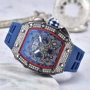 Luxury diamond-encrusted tonneau chronograph watch with skeleton dial and blue strap