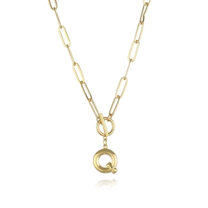 Detail of gold paperclip chain necklace with a T-bar clasp and letter Q disk pendant