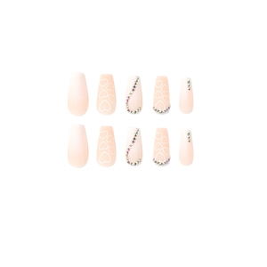 Pink gradient matte fake nails with heart patterns and colorful rhinestones in coffin shape