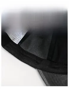 Detail of the inner moisture-wicking band and washing label on a baseball cap