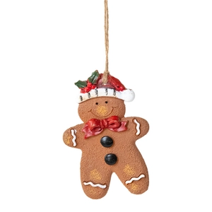Handcrafted gingerbread man Christmas ornament with red hat and bow tie for holiday tree