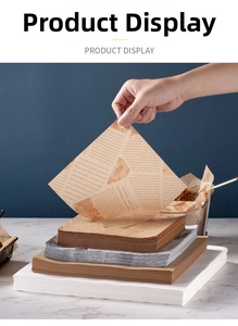 Close-up of greaseproof food wrapping paper with vintage newspaper patterns and plain colors