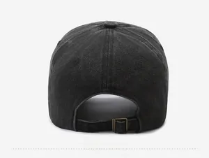 Detail view of the vintage washed denim baseball cap with an adjustable metal buckle