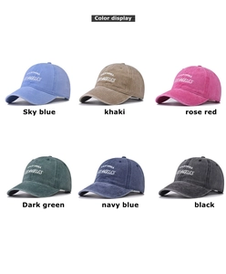 Detail view of cotton baseball caps in six colors with Los Angeles embroidery