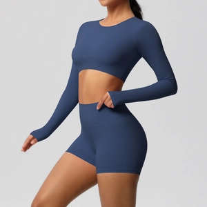 Detail of high-waist navy yoga shorts with brushed fabric texture and slim fit design