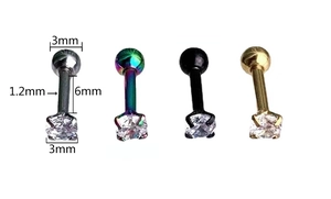 Detail view of 1.2mm surgical steel labret studs with 3mm zircons in four metallic colors