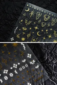 Detail of M-067 embossed nail stickers featuring gold foil moon and sun bohemian patterns