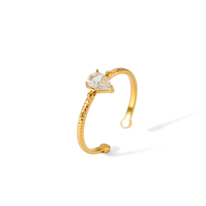 Detail of 18k gold plated ring featuring hammered texture and water drop zircon