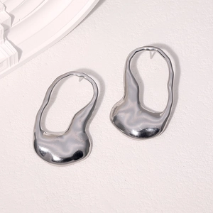 Minimalist silver irregular liquid metal earrings made of polished stainless steel