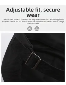 Detail view of the adjustable metal buckle and woven strap on a black flat top cap