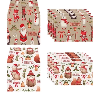 Christmas table runner and placemats set featuring festive reindeer and Santa patterns