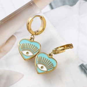 Detailed view of gold evil eye heart earrings with light blue enamel and polished finish