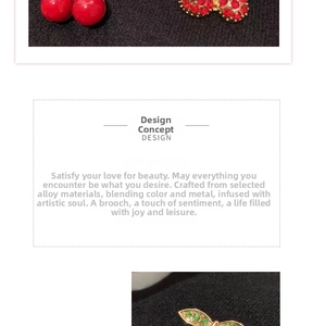 Detailed macro view of an elegant alloy brooch with vibrant red and green rhinestones