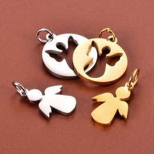 Detail view of hollow and solid angel charms in gold and silver stainless steel
