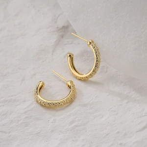 Chic 18K gold plated C-shaped earrings with textured surface for a minimalist modern look