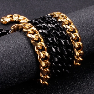 Men's thick Cuban link chain bracelet in polished gold and black stainless steel