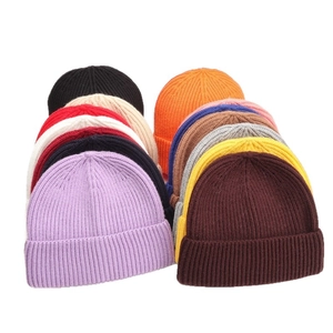 Unisex ribbed knit beanie hats in multiple colors for winter warmth and outdoor fashion