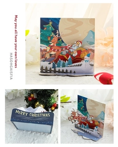 Detailed 3D Christmas pop-up card featuring Santa, reindeer, and snowy village scenery