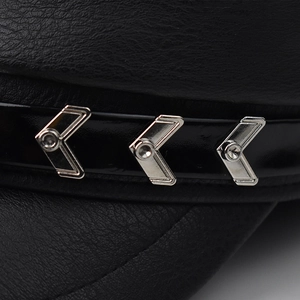 Faux leather newsboy hat with crocodile pattern and silver arrow metal accents